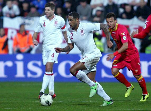 26.03.2013 Podgorica(Montenegro) Montenegro-England FIFA world cup Brazil qualifiers men football Gien Johnson(c) England and Elsad Zverotic(r) Montenegro :