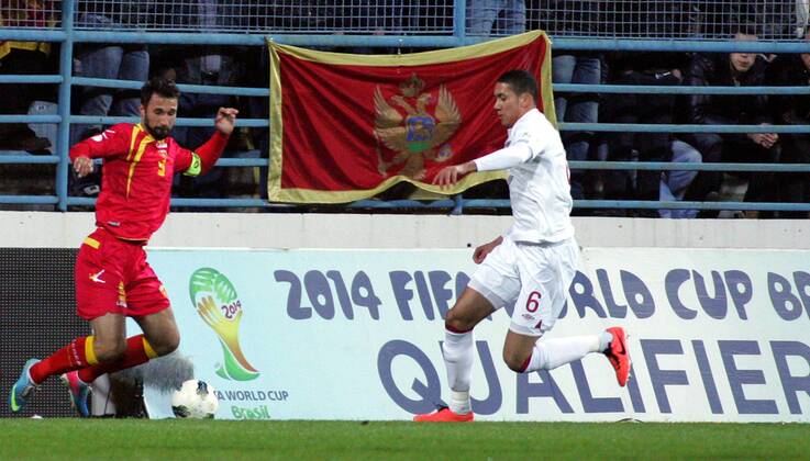 26.03.2013 Podgorica(Montenegro) Montenegro-England FIFA world cup Brazil qualifiers men football Chris Smalling(r) England and Mirko Vucinic(L) Montenegro :