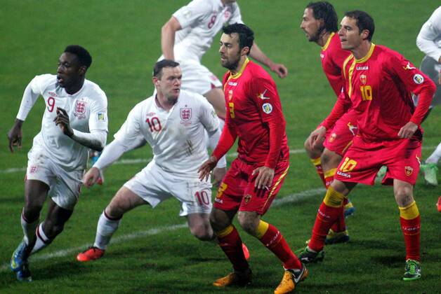 26.03.2013 Podgorica(Montenegro) Montenegro-England FIFA world cup Brazil qualifiers men football Danny Welbeck(L) with Wayne Rooney(2L) England and Marko Basa(3L) with Andrija Delibasic(r) Montenegro :