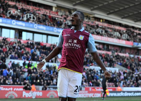 Christian Benteke of Aston Villa celebrates scoring the third goal - Barclays Premier League - Stoke City vs Aston Villa - Britannia Stadium - Stoke on Trent - England - 06 04 13 - Picture Simon Bellis Sportimage EDITORIAL USE ONLY. No use with unauthorised audio, video, data, fixture lists, club league logos or live services. Online in-match use limited to 120 images, no video emulation. No use in betting, games or single club league player publications.