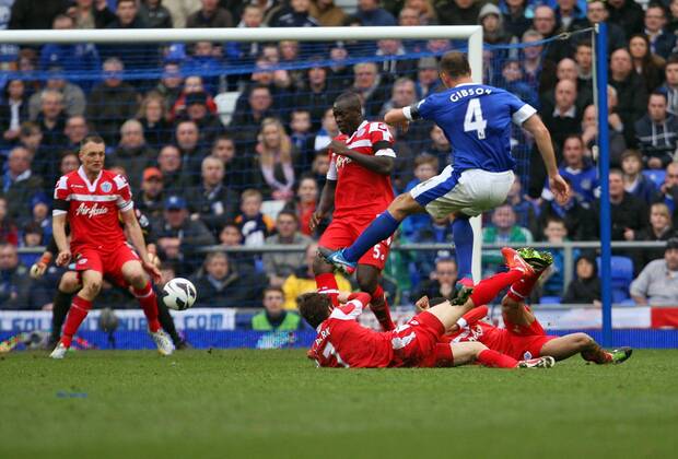 Evertons s Darren Gibson s shot hits QPR Defender Clint Hill nad ends up in the back of the net- Barclays Premier League - FC Everton vs Queens Park Rangers QPR - Goodison Park -Liverpool- 13th April 2013 - EDITORIAL USE ONLY. No use with unauthorised audio, video, data, fixture lists, club league logos or live services. Online in-match use limited to 120 images, no video emulation. No use in betting, games or single club league player publications.