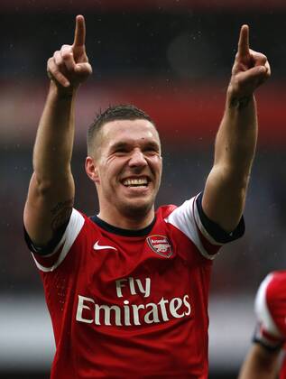 LONDON, April 13, 2013 - Lukas Podolski of Arsenal celebrates scoring during the Barclays Premier League match between Arsenal and Norwich City at the Emirates Stadium in London, Britain, on April 13, 2013. Arsenal won 3-1. (Xinhua Wang Lili)