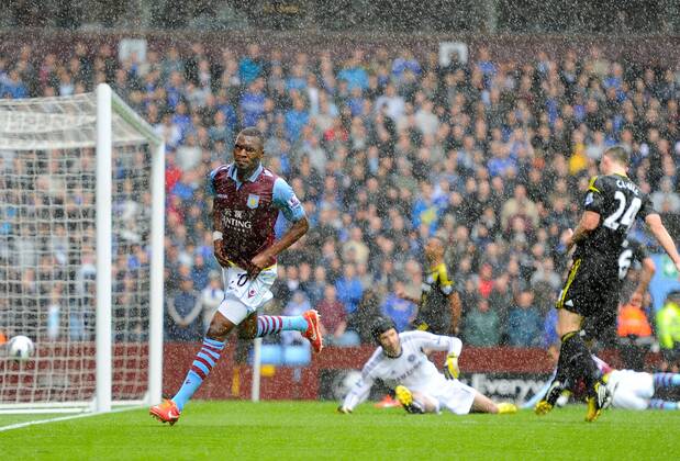 Christian Benteke of Aston Villa celebrates scoring the first goal in the rain - Barclays Premier League - Aston Villa vs Chelsea - Villa Park Stadium - Birmingham - England - 11 05 13 - Picture Simon Bellis Sportimage EDITORIAL USE ONLY. No use with unauthorised audio, video, data, fixture lists, club league logos or live services. Online in-match use limited to 120 images, no video emulation. No use in betting, games or single club league player publications.