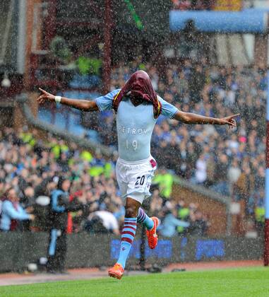 Christian Benteke of Aston Villa celebrates scoring the first goal by unveiling a t-shirt in support of Stiliyan Petrov of Aston Villa who is fighting Leukemia - Barclays Premier League - Aston Villa vs Chelsea - Villa Park Stadium - Birmingham - England - 11 05 13 - Picture Simon Bellis Sportimage EDITORIAL USE ONLY. No use with unauthorised audio, video, data, fixture lists, club league logos or live services. Online in-match use limited to 120 images, no video emulation. No use in betting, games or single club league player publications.