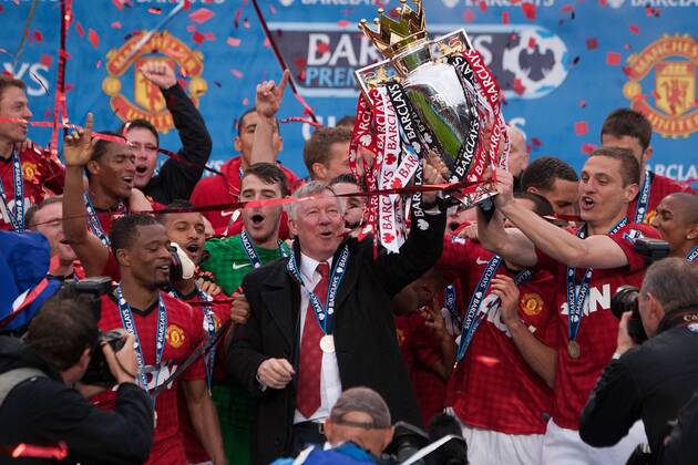 Football - Premier League 2012 2013 - Manchester United - Alex Ferguson, manager of Manchester United leads trophy celebrations at Old Trafford