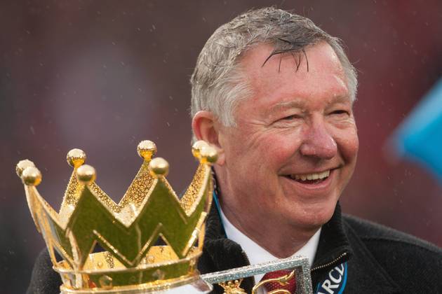 Football - Premier League 2012 2013 - Manchester United - Alex Ferguson, manager of Manchester United celebrates with the trophy at Old Trafford