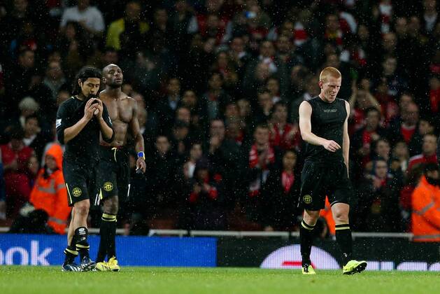 Football - 2012 2013 Premier League - Arsenal vs Wigan Wigan s Ben Watson, Wigan s Emmerson Boyce and Wigan s Roger Espinoza look dejected after losing at the Emirates Stadium, London