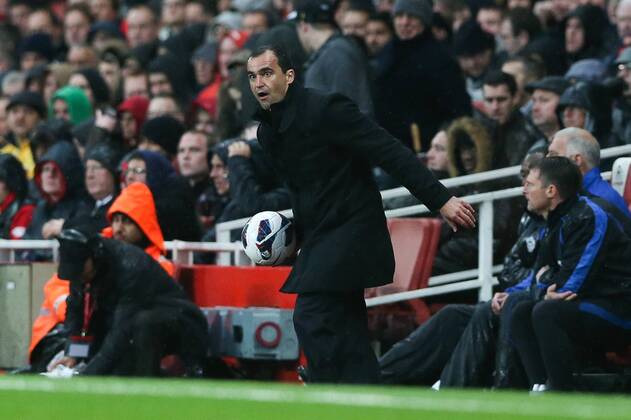 Football - 2012 2013 Premier League - Arsenal vs Wigan Wigan manager Roberto Martinez desperate to get the ball back into play at the Emirates Stadium, London