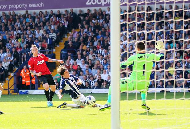 Manchester United s Alex Buttner scoring his sides third goal - Barclays Premier League - West Bromwich Albion vs Manchester United - The Hawthrowns - West Bromwich - 19 05 2013 - Pic David Klein Sportimage EDITORIAL USE ONLY. No use with unauthorised audio, video, data, fixture lists, club league logos or live services. Online in-match use limited to 120 images, no video emulation. No use in betting, games or single club league player publications.