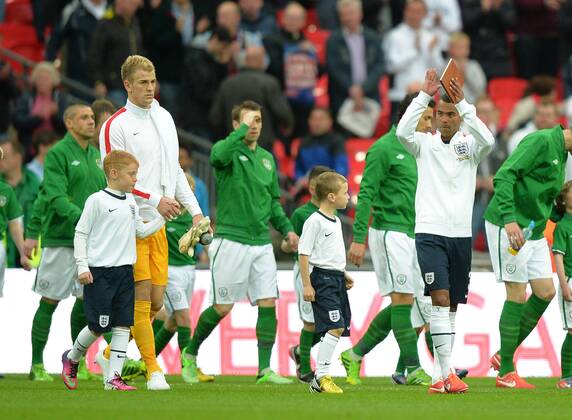 Ashley Cole of England leads out the team as captain - International Friendly - England vs Republic of Ireland - Wembley Stadium - London - England - 29 05 13 - Picture Simon Bellis Sportimage EDITORIAL USE ONLY. No use with unauthorised audio, video, data, fixture lists, club league logos or live services. Online in-match use limited to 120 images, no video emulation. No use in betting, games or single club league player publications.