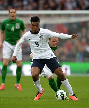 Daniel Sturridge of England holds off Glenn Whelan of Ireland - International Friendly - England vs Republic of Ireland - Wembley Stadium - London - England - 29 05 13 - Picture Simon Bellis Sportimage EDITORIAL USE ONLY. No use with unauthorised audio, video, data, fixture lists, club league logos or live services. Online in-match use limited to 120 images, no video emulation. No use in betting, games or single club league player publications.