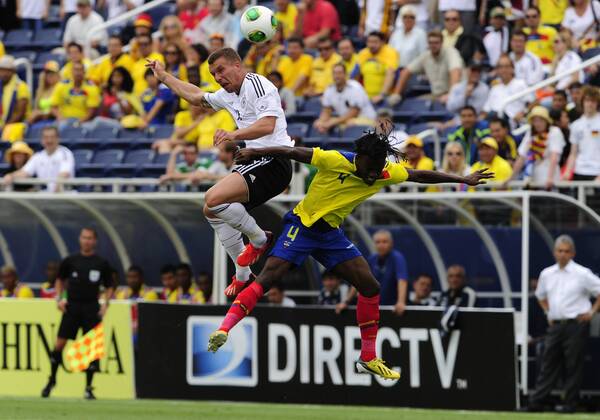 MAY 29 2013: Boca Raton, Florida, USA, Germany s (10) Lukas Podolski and Ecuador s (4 ) Juan Carlos Parades during Germany v Ecuador friendly International soccer match. SOCCER: MAY 29 Germany v Ecuador Icon1305290646 EDITORIAL USE ONLY