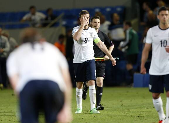 England s Jordan Henderson looks on dejected at the final whistle - England U21 vs Italy U21 - UEFA U21 Championship 2013 - Bloomfield Stadium - Tel Aviv - 05 06 2013 - EDITORIAL USE ONLY. No use with unauthorised audio, video, data, fixture lists, club league logos or live services. Online in-match use limited to 120 images, no video emulation. No use in betting, games or single club league player publications.