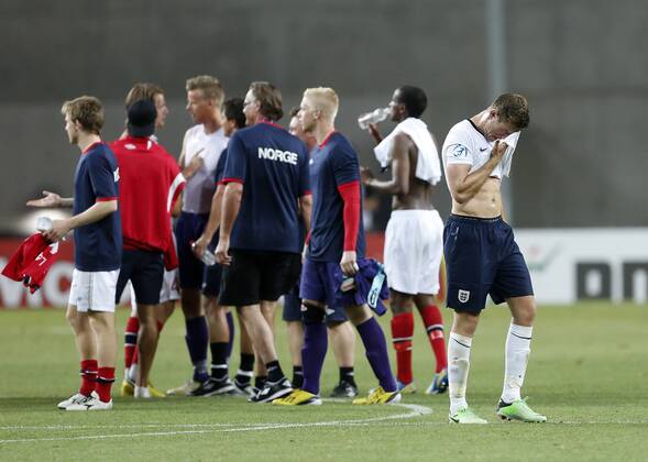 England s Jordan Henderson looks on dejected at the final whistle - England U21 vs Norway U21 - UEFA U21 Championship 2013 - Ha Moshava Stadium - Petah Tikva - Israel - 08 06 2013 - Pic David Klein Sportimage EDITORIAL USE ONLY. No use with unauthorised audio, video, data, fixture lists, club league logos or live services. Online in-match use limited to 120 images, no video emulation. No use in betting, games or single club league player publications.