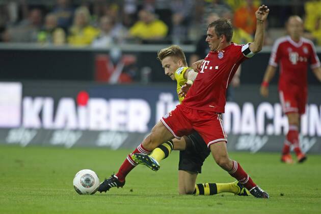 Supercup Deutschland 2013 Borussia Dortmund vs. FC Bayern München 4:2 HIER rot Philipp Lahm (FC Bayern München) + schwarzgelb Marco Reus (Borussia Dortmund)