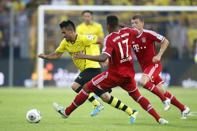 Supercup Deutschland 2013 Borussia Dortmund vs. FC Bayern München 4:2 HIER vlnr Ilkay Gündogan (Borussia Dortmund) + Jerome Boateng und Toni Kroos (FC Bayern München)