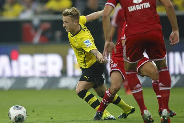 Supercup Deutschland 2013 Borussia Dortmund vs. FC Bayern München 4:2 HIER Marco Reus (Borussia Dortmund) ist zu wendig und zu quirlig für viele stabile Bayern