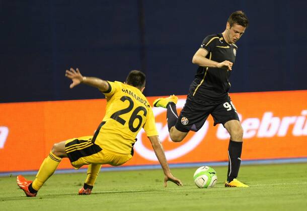 Zagreb, 30.7.2013. - UEFA Champions League 2013 2014, Third Qualifying Round, Stadium Maksimir. GNK Dinamo Zagreb (blue) - FC Sheriff Tiraspol (yellow). Duje Cop vs Miral Samardzic GNK Dinamo - FC Sheriff