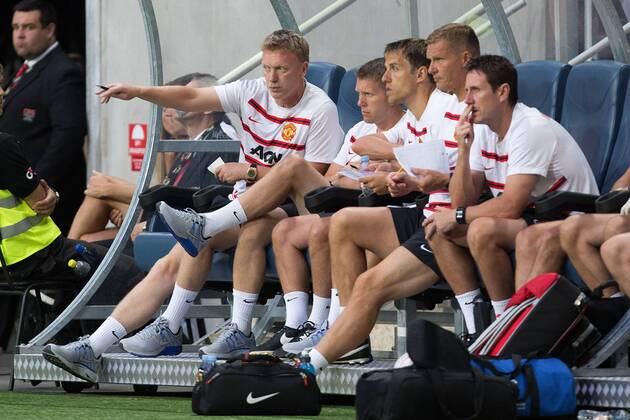 David Moyes, manager of Manchester United watches on from the bench alongside his coaching staff - AIK Stockholm vs. Manchester United - Friendly - Friends Arena, Stockholm - Sweden - 06 08 2013 Pic Philip Oldham Sportimage EDITORIAL USE ONLY. No use with unauthorised audio, video, data, fixture lists, club league logos or live services. Online in-match use limited to 120 images, no video emulation. No use in betting, games or single club league player publications.