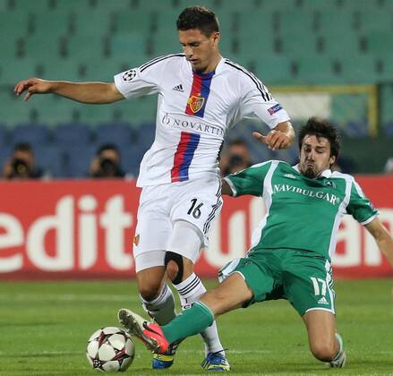 21.08.2013 Sofia(Bulgaria) PFC Ludogorets-FC Basel Razgrad UEFA Champion League play off men s football Fabian Schär (L) FC Basel and Dani Abalo(R) PFC Ludogorets 