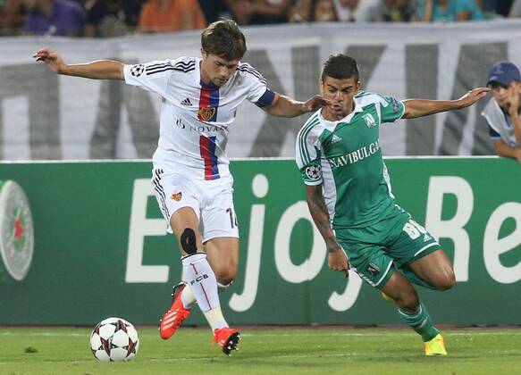 21.08.2013 Sofia(Bulgaria) PFC Ludogorets-FC Basel Razgrad UEFA Champion League play off men s football Valentin Stocker(L) FC Basel and Junior Caicara(R) PFC Ludogorets 