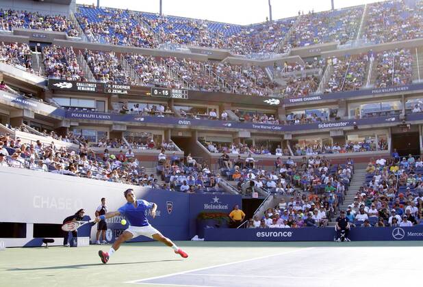 Roger Federer of returns a ball in the first round match in Arthur Ashe Stadium on day two at the U.S. Open Tennis Championships at the USTA BillieJeanKing National Tennis Center in New York City on August 27, 2013.  NYP20130827130