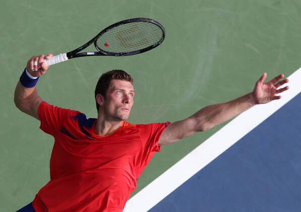 US Open 2013, USTA Billie Jean King National Tennis Center, Flushing Meadows, New York, ITF Grand Slam Tennis Tournament, Daniel Brands (GER),Aktion,Aufschlag,Ballwurf,Einzelbild,Halbkoerper, Querformat,von oben,
