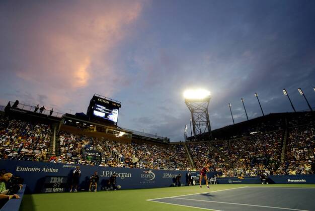 Jie Zheng of China serves in the third set in the second round in Louis Armstrong Stadium on day three at the U.S. Open Tennis Championships at the USTA Billie Jean King National Tennis Center in New York City on August 28, 2013.  NYP20130828105