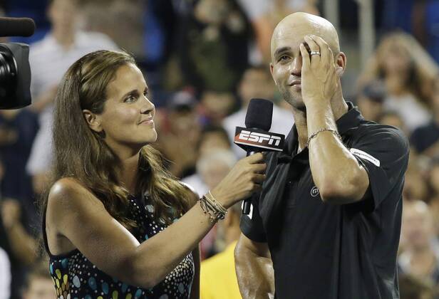 James Blake reacts as he speaks to Mary Joe Fernandez on the court after his first round match on day three at the U.S. Open Tennis Championships at the USTA Billie Jean King National Tennis Center in New York City on August 28, 2013.  NYP20130828121