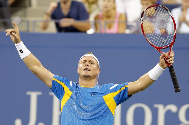 Lleyton Hewitt of Australia reacts after match point in the second round match in Arthur Ashe Stadium on day five at the U.S. Open Tennis Championships at the USTA Billie Jean King National Tennis Center in New York City on August 30, 2013.  NYP20130830125