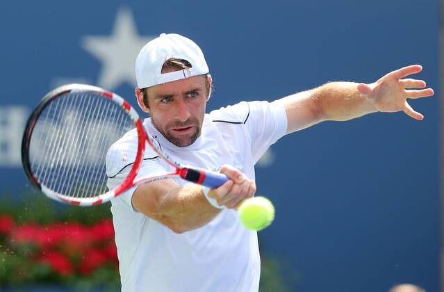 US Open 2013, USTA Billie Jean King National Tennis Center, Flushing Meadows, New York, ITF Grand Slam Tennis Tournament . Benjamin Becker (FRA),Aktion,Einzelbild, Halbkoerper,Querformat