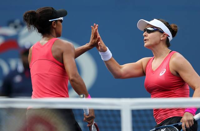 TENNIS - WTA, US Open 2013 NEW YORK CITY,NEW YORK,USA,31.AUG.13 - TENNIS - WTA Tennis Damen Tour, US Open 2013, Grand Slam, Flushing Meadows, Doppel. Bild zeigt Abigail Spears (USA) und Raquel Kops Jones (USA).