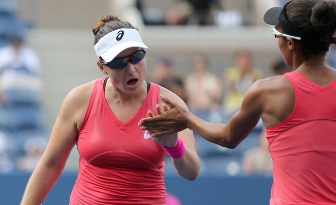 TENNIS - WTA, US Open 2013 NEW YORK CITY,NEW YORK,USA,31.AUG.13 - TENNIS - WTA Tennis Damen Tour, US Open 2013, Grand Slam, Flushing Meadows, Doppel. Bild zeigt Abigail Spears (USA) und Raquel Kops Jones (USA).