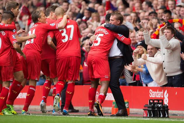 Manager of Liverpool, Brendan Rodgers congratulates opening goal scorer Daniel Sturridge - Liverpool vs. Manchester United - Barclay s Premier League - Anfield - Liverpool - 01 09 2013 Pic Philip Oldham Sportimage EDITORIAL USE ONLY. No use with unauthorised audio, video, data, fixture lists, club league logos or live services. Online in-match use limited to 120 images, no video emulation. No use in betting, games or single club league player publications.