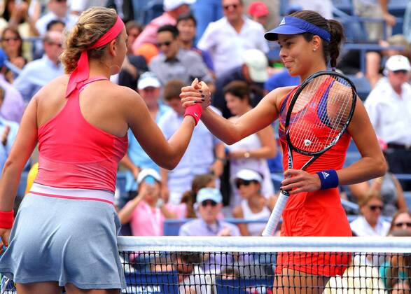 Victoria Azarenka of Belarus (L) and Ana Ivanovic of Serbia shake hands at the conclusion of their fourth-round match where Azarenka won at the U.S. Open Championship held at the USTA BillieJeanKing National Tennis Center on September 3, 2013 in New York City. UPI Photo Monika Graff  NYP20130903310