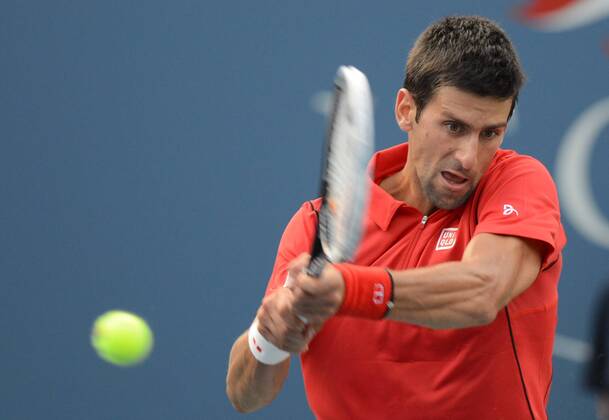 NEW YORK, Sept. 3, 2013 (Xinhua) -- Novak Djokovic of Serbia returns a shot during the men s singles fourth round match at the 2013 US Open tennis championships in New York, the United States, on Sept. 3, 2013. OPEN 