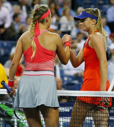 Victoria Azarenka of Belarus (L) and Daniela Hantuchova of Slovkia shake hands after Azarenka won their quarter-finals match at the U.S. Open Championship held at the USTA Billie Jean King National Tennis Center on September 4, 2013 in New York City. . UPI Photo Monika Graff  NYP20130904315