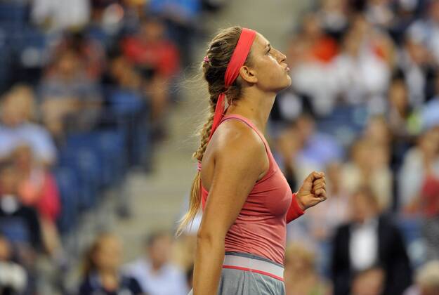NEW YORK, Sept. 4, 2013 -- Victoria Azarenka of Belarus celebrates during the women s quarterfinal match at the U.S. Open tennis championships in New York Sept. 4, 2013. 