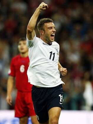 Rickie Lambert of England celebrates scoring during the FIFA 2014 World Cup Qualifying Group H match between England and Moldova at Wembley Stadium in London, Britain on Sept. 6, 2013. England won 4-0.(Xinhua Wang Lili) (SP)BRITAIN-LONDON-SOCCER-FIFA 2014 WORLD CUP QUALIFIER-ENGLAND VS MOLDOVA 