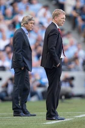 David Moyes, manager of Manchester United watches on - Manchester City vs Manchester United - Barclay s Premier League - Etihad Stadium - Manchester - 22 09 2013 Pic Philip Oldham Sportimage EDITORIAL USE ONLY. No use with unauthorised audio, video, data, fixture lists, club league logos or live services. Online in-match use limited to 120 images, no video emulation. No use in betting, games or single club league player publications.