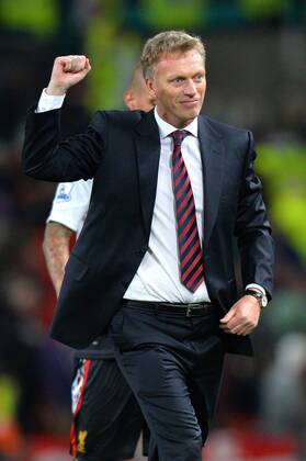 David Moyes manager of Manchester United acknowledges the win by punching the air - Capital One Cup - Third Round - Manchester United, ManU - FC Liverpool. Old Trafford Stadium - Manchester - 25 09 13 - PicturexSimon BellisxSportimage EDITORIAL USE ONLY. No use with unauthorised audio, video, data, fixture lists, club league logos or live services. Online in-match use limited to 120 images, no video emulation. No use in betting, games or single club league player publications.