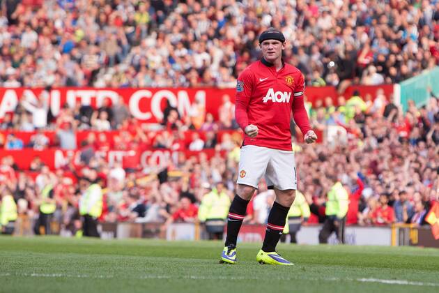 Wayne Rooney of Manchester United celebrates scoring the equalising goal - Manchester United vs. West Bromwich Albion - Barclay s Premier League - Old Trafford - Manchester - 28 09 2013 Pic Philip Oldham Sportimage EDITORIAL USE ONLY. No use with unauthorised audio, video, data, fixture lists, club league logos or live services. Online in-match use limited to 120 images, no video emulation. No use in betting, games or single club league player publications.