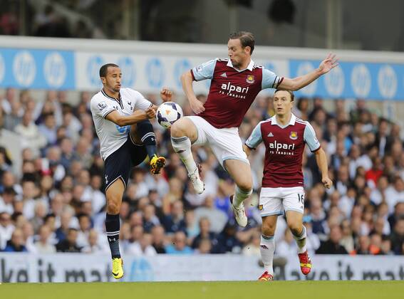 Tottenham s Andros Townsend tussles with West Ham s Kevin Nolan Tottenham Hotspur - West Ham United - Premier League - White Hart Lane - London - England -06 10 2013 - xDavidxKleinx EDITORIAL USE ONLY. No use with unauthorised audio, video, data, fixture lists, club league logos or live services. Online in-match use limited to 120 images, no video emulation. No use in betting, games or single club league player publications.
