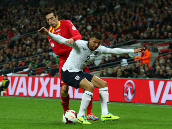 England v Montenegro - World Cup Qualifier . . Wembley, London, UK . . 11.10.2013 Vladimir Volkov (M) Kyle Walker (E)