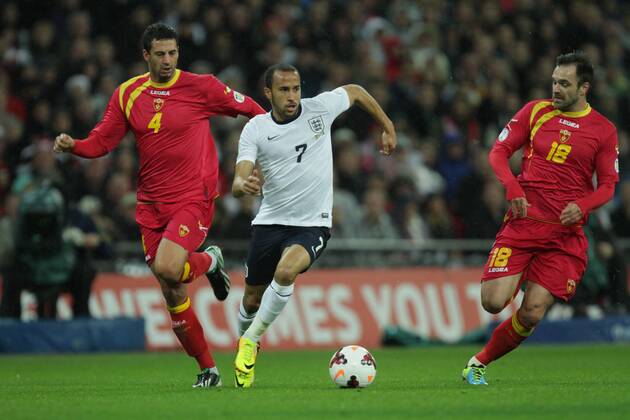 England v Montenegro - World Cup Qualifier . . Wembley, London, UK . . 11.10.2013 Milan Jovanovic (M) Andros Townsend (E) Nikola Drincic (M) Farm, Peterborough.