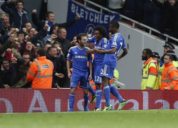 Chelsea s Juan Mata celebrates scoring his sides second goal Arsenal v Chelsea - Capital One Cup Fourth Round - The Emirates - London - England -29 10 2013 - Pic David Klein Sportimage EDITORIAL USE ONLY. No use with unauthorised audio, video, data, fixture lists, club league logos or live services. Online in-match use limited to 120 images, no video emulation. No use in betting, games or single club league player publications.