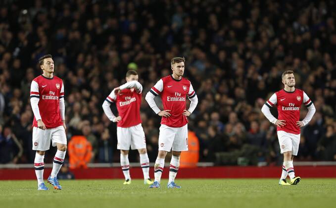 Arsenal s Mesut Ozil and Aaron Ramsey look on dejected after going 2-0 down Arsenal v Chelsea - Capital One Cup Fourth Round - The Emirates - London - England -29 10 2013 - Pic David Klein Sportimage EDITORIAL USE ONLY. No use with unauthorised audio, video, data, fixture lists, club league logos or live services. Online in-match use limited to 120 images, no video emulation. No use in betting, games or single club league player publications.