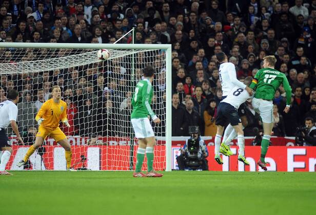 Football - 2013 International Friendly - England vs. Germany Per Mertesacker - Germany (17) heads his goal past Joe hart at Wembley. COLORSPORT ANDREW COWIE
