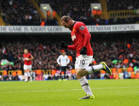 Manchester United s Wayne Rooney celebrates scoring his sides opening goal Tottenham Hotspur v Manchester United (ManU) - Premier League - White Hart Lane - London - 01 12 2013 - EDITORIAL USE ONLY. No use with unauthorised audio, video, data, fixture lists, club league logos or live services. Online in-match use limited to 120 images, no video emulation. No use in betting, games or single club league player publications.