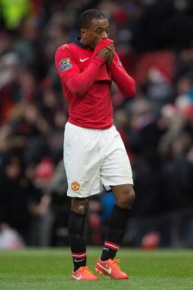 Patrice Evra of Manchester United looks dejected as he leaves the pitch following defeat - Manchester United vs. Newcastle United - Barclays Premier League - Old Trafford - Manchester - 04 12 2013 Pic Philip Oldham Sportimage EDITORIAL USE ONLY. No use with unauthorised audio, video, data, fixture lists, club league logos or live services. Online in-match use limited to 120 images, no video emulation. No use in betting, games or single club league player publications.